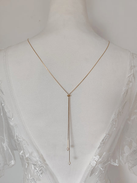 Collier de dos Romy