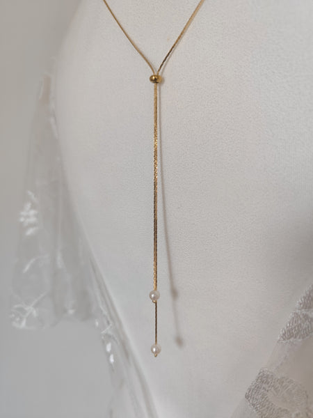 Collier de dos Romy